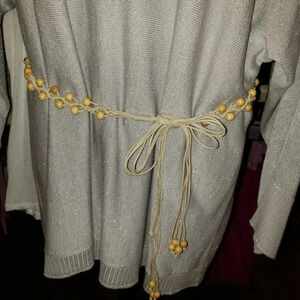 Beaded belt with tassels in‎ cream